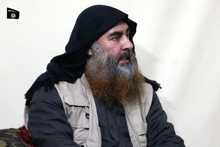 FILE - This file image made from video posted on a militant website April 29, 2019, purports to show the leader of the Islamic State group, Abu Bakr al-Baghdadi, being interviewed by his group's Al-Furqan media outlet. President Trump says al-Baghdadi died Saturday night.