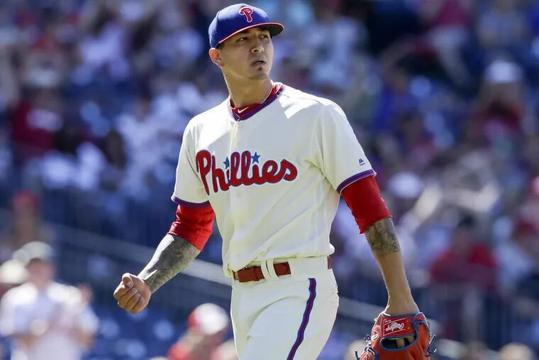 Phillies’ pitcher Vince Velasquez walks off the mound pumping his fist against the Atlanta Braves on Sunday, July 30, 2017 in Philadelphia.