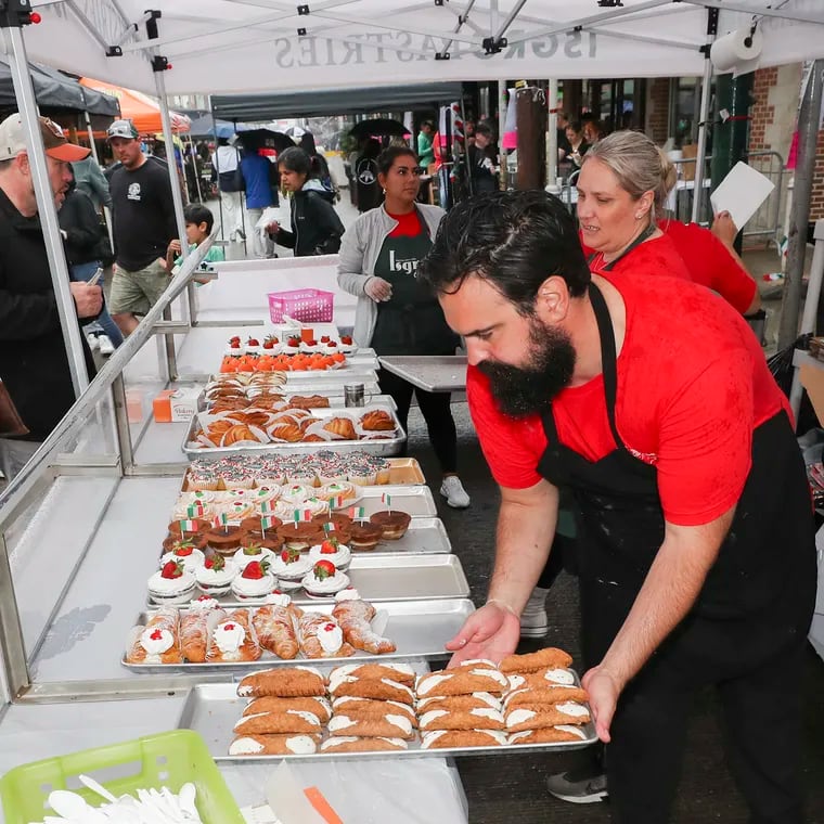 People line up to buy Isgro Pastries at the annual Italian Market Festival in Philadelphia on Saturday, May 20, 2023. The festival returns this weekend Saturday, May 18 and Sunday, May 19.