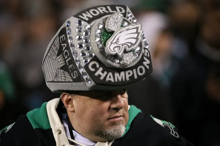 An Eagles fan wears a Super Bowl ring hat before a game against the Washington Redskins at Lincoln Financial Field in South Philadelphia on Monday, Dec. 3, 2018.