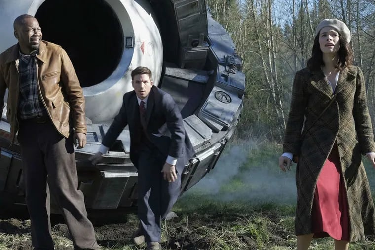 In NBC's new "Timeless," Malcolm Barrett (left) is a scientist, Matt Lanter a soldier, and Abigail Spencer a history professor sent back in time to thwart an anti-America villain.