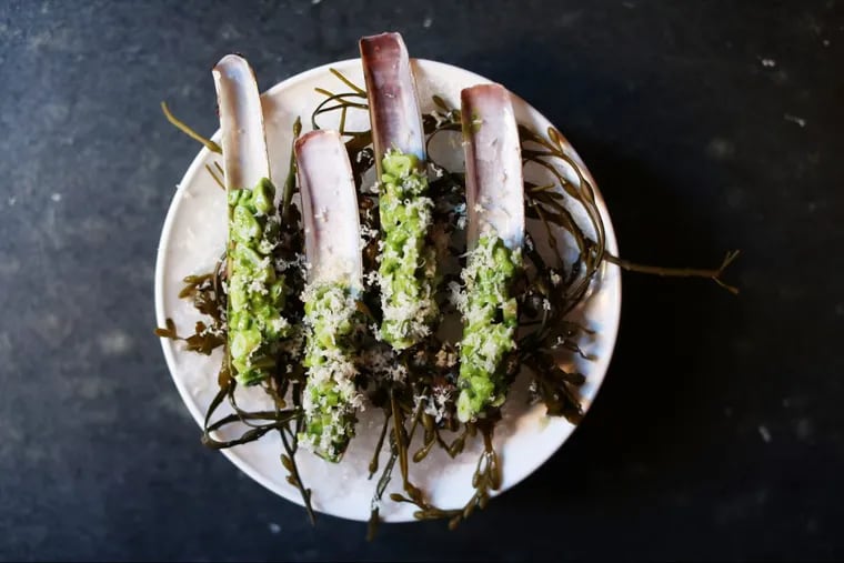 Chilled razor clams with celery, apple, and horseradish are a raw bar highlight at Royal Boucherie.