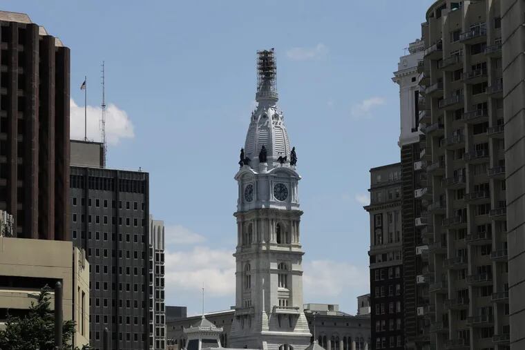 This June 1 photo shows scaffolding surrounding the sculpture of William Penn atop City Hall.