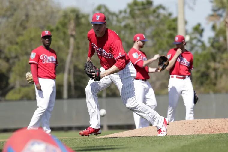 Phillies starting pitcher Jerad Eickhoff does drills at spring training in Clearwater, Fla. on Thursday.