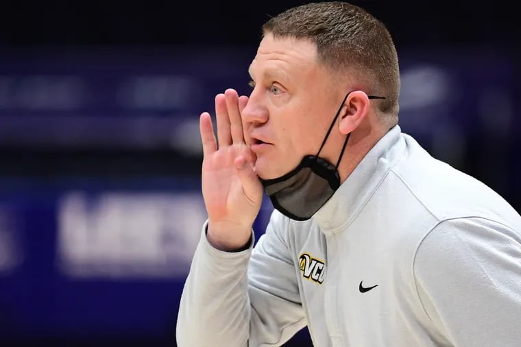 VCU head coach Mike Rhoades guided his team to a regular-season championship in the Atlantic 10 conference this season. VCU joins Dayton as the top favorites to win the Atlantic 10 Tournament this week in Brooklyn, New York. (Photo by Emilee Chinn/Getty Images)