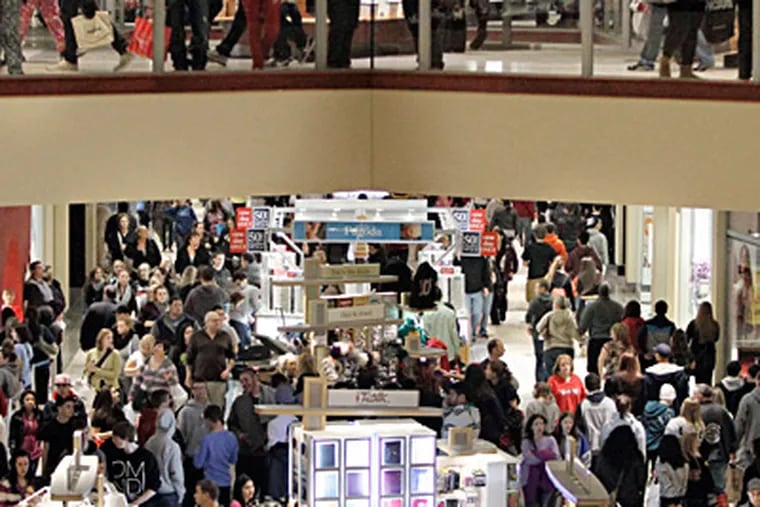 Echoes of &quot;The Walking Dead&quot;? Deptford Mall, packed at 12:50 a.m. Friday. ELIZABETH ROBERTSON / Staff Photographer
