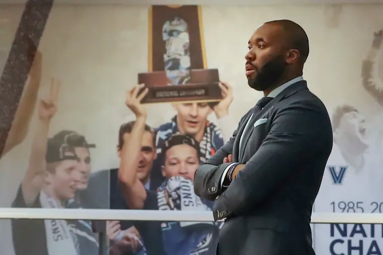 Villanova coach Kyle Neptune waiting behind the scenes for the start of his introductory press conference last month at the Finneran Pavilion.