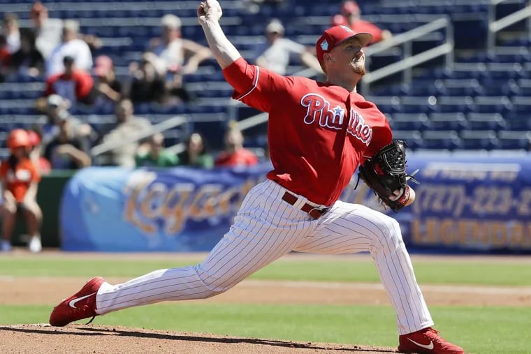 Tom Eshelman, shown here with the Phillies during spring training, took the loss for triple-A Lehigh Valley on Sunday.
