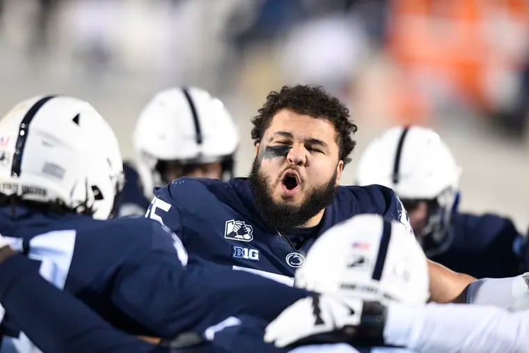 Penn State defensive tackle Antonio Shelton fires up his teammates during pregame before the Dec. 19 game against Illinois.