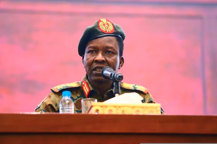 Sudan's ruling Military Council spokesperson Shamseddine Kabbashi makes a speech as he holds a press conference at the Presidential Palace in Khartoum, Sudan, Thursday, June 13, 2019.