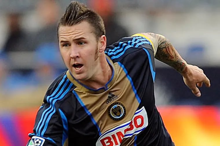 Union defender Danny Califf is still grappling with injury issues related to offseason knee surgery. (Michael Perez/AP Photo)