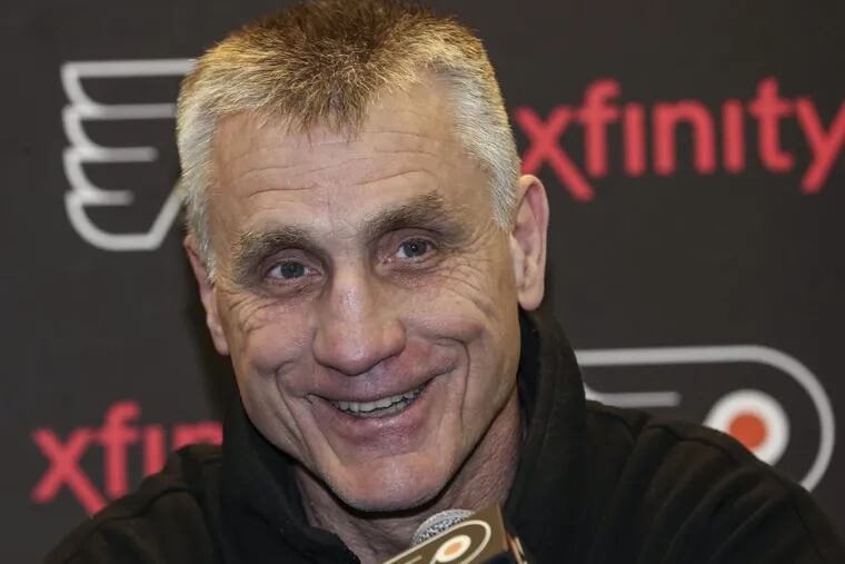 Paul Holmgren, the Flyers’ president, grew up as a die-hard Vikings fan but also has strong ties to the Eagles.