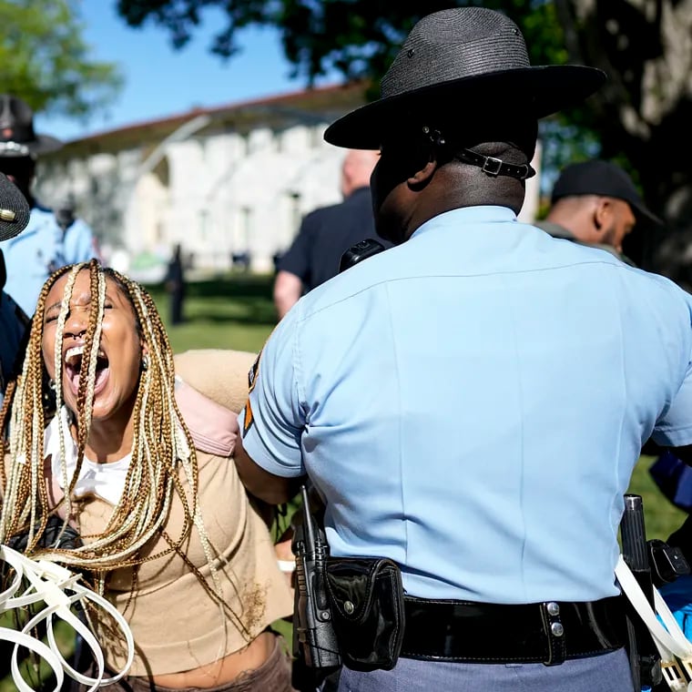 Georgia State Patrol officers detain a demonstrator on the campus of Emory University during a pro-Palestinian demonstration Thursday in Atlanta.