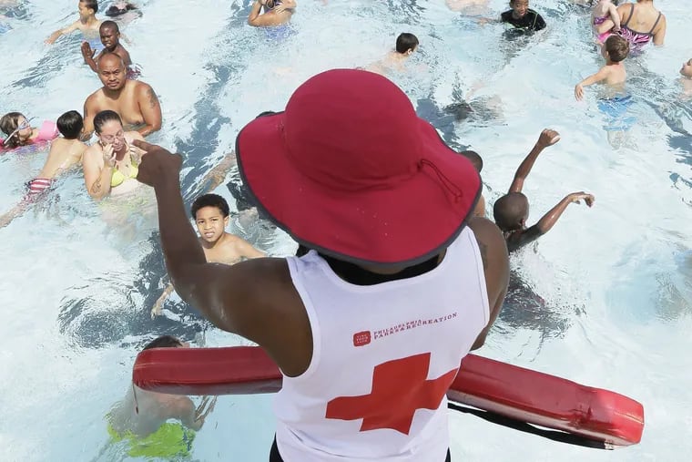 Lifeguard Ashley Lynn Quattlebaum watches over the swimmers in the pool at the Murphy Recreation Center in South Phila. on June 22, 2017. The City of Philadelphia has just released pool opening dates for summer, 2018.