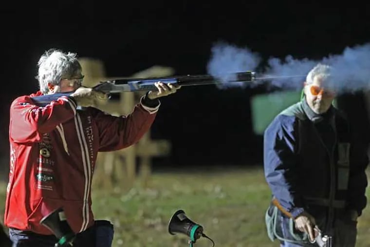 Michael Gottlieb , firing at a target as Ron Jones looks on, said that for politicians &quot;to capitalize on a tragedy . . . to push their agenda is completely wrong.&quot; MICHAEL BRYANT / Staff