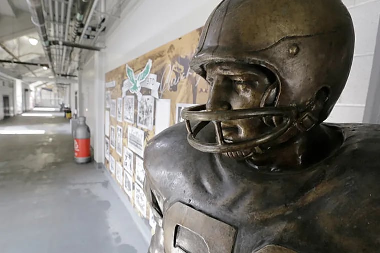 The Chuck Bednarik statue on the north concourse at Franklin Field in
Phila. on March 21, 2015. (Elizabeth Robertson/Staff Photographer)