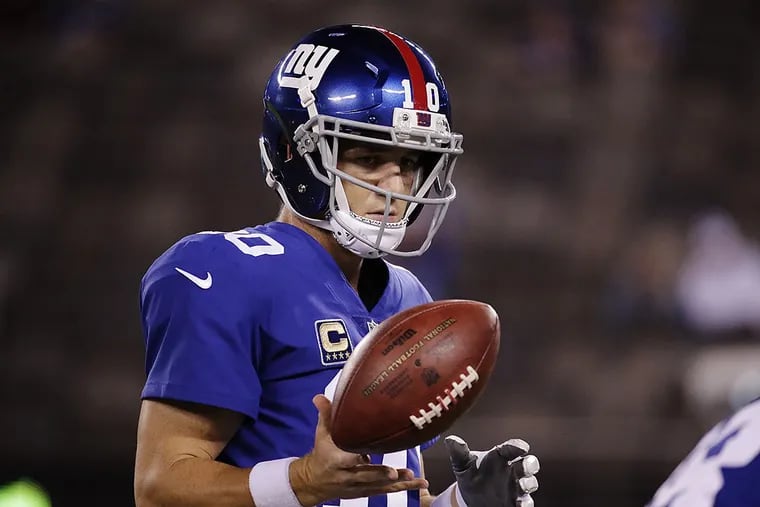 New York Giants’ Eli Manning warms up before an NFL football game against the Detroit Lions Monday, Sept. 18, 2017, in East Rutherford, N.J.