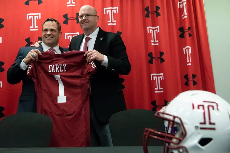 Rod Carey, right, poses for a photo with Temple Athletic Director Patrick Kraft during a press conference announcing Carey as the new head coach of Temple Football at the Liacouras Center in Philadelphia on Friday, Jan. 11, 2019. Carey was formerly the head coach at Northern Illinois University.