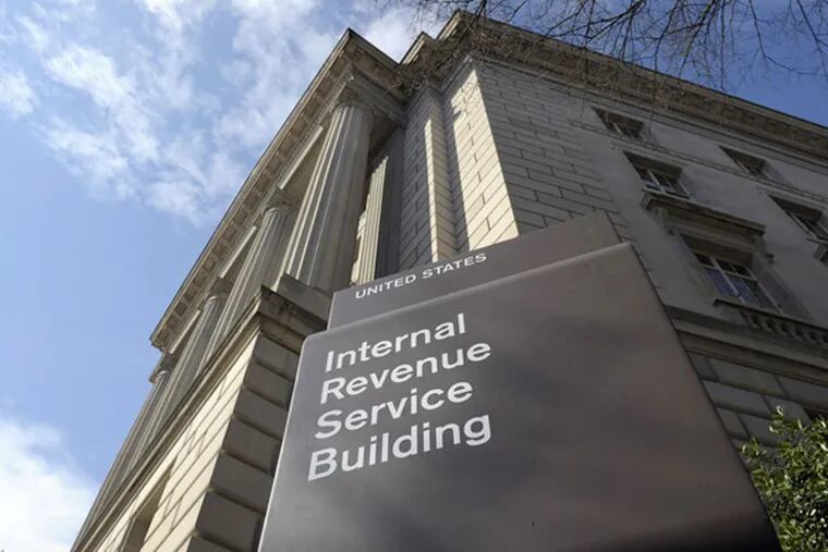 FILE - This March 22, 2013 file photo shows the exterior of the Internal Revenue Service building in Washington.  (AP Photo/Susan Walsh, File)
