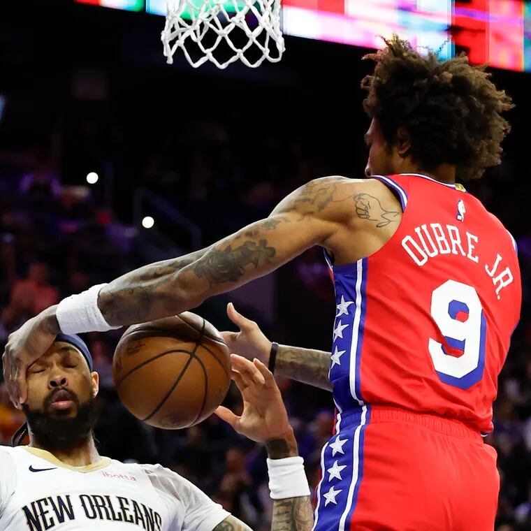 Pelicans forward Brandon Ingram gets hit in the face by Sixers guard Kelly Oubre Jr., during the third quarter.