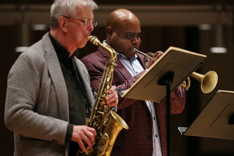 Trumpeter Terell Stafford, right, is director of both jazz and classical studies at Temple University's Boyer College of Music and Dance, and has now been appointed the Artistic Director for Jazz with the Philly Pops. He's shown in rehearsal this spring with alto sax player Dick Oatts, a jazz professor at Temple.