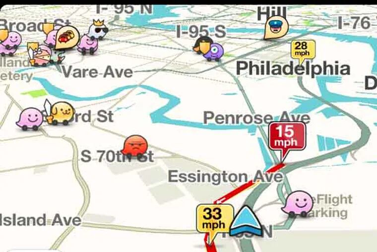 apptitude18 screen shot from the app called Waze, where a map shows road hazards ahead -- and the locations of other Waze app users, depicted as little smiling blobs on wheels.