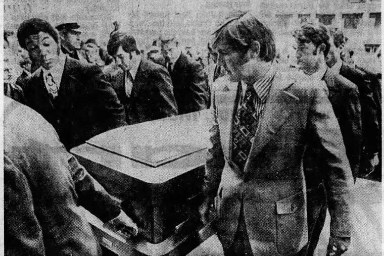 Players from the Detroit Lions and the Eagles carry the casket of wide receiver Chuck Hughes, who died on Oct. 24, 1971.