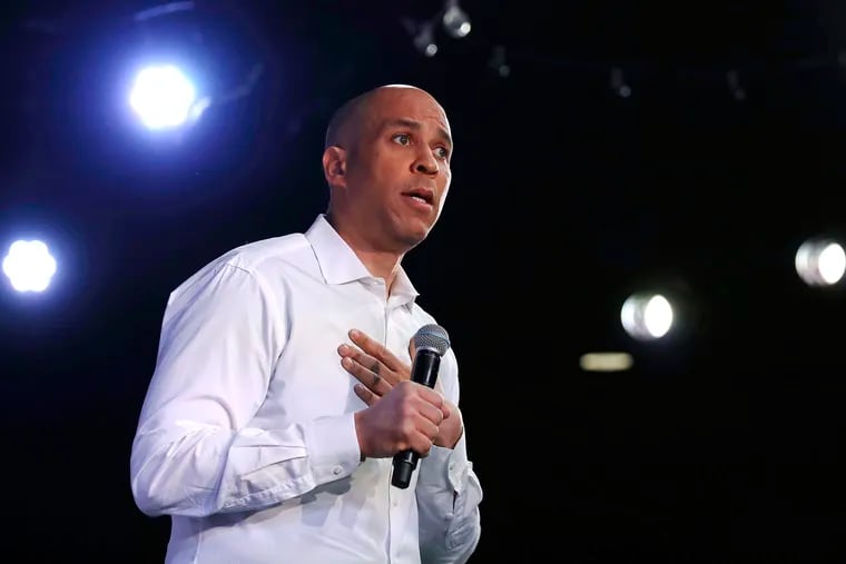 U.S. Sen. Cory Booker, D-N.J., addresses a gathering during a campaign stop in Portsmouth, N.H., Saturday, Feb. 16, 2019. (AP Photo/Charles Krupa)
