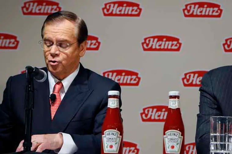 H.J. Heinz Co. CEO William Johnson, left, and 3G Capital Managing Partner Alex Behring speak at a news conference at the world headquarters of the H.J. Heinz Co. on Thursday, Feb. 14, 2013, in Pittsburgh. Billionaire investor Warren Buffett's Berkshire Hathaway and its partner on the deal. 3G Capital, are dipping into the ketchup business as part of a $23.3 billion deal to buy the Heinz ketchup company. (AP Photo/Keith Srakocic)