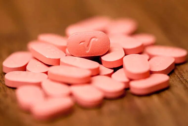 Tablets of the generic antipsychotic drug Risperidone, used to treat schizophrenia.
