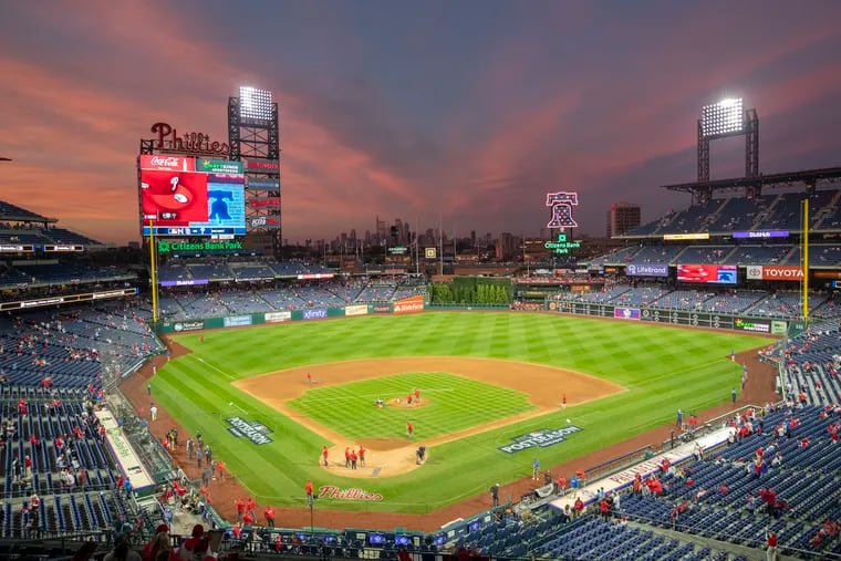 A sunset over Citizens Bank Park before Game 4 between the Phillies and Padres in the National League Championship Series last year. The weather for the wild-card series this year is nearly ideal.