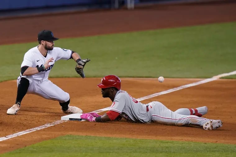 Odubel Herrera's leadoff triple in the top of the ninth inning led to him scoring the winning run during the Phillies' 3-2 victory against the Miami Marlins on Thursday afternoon at loanDepot Park.