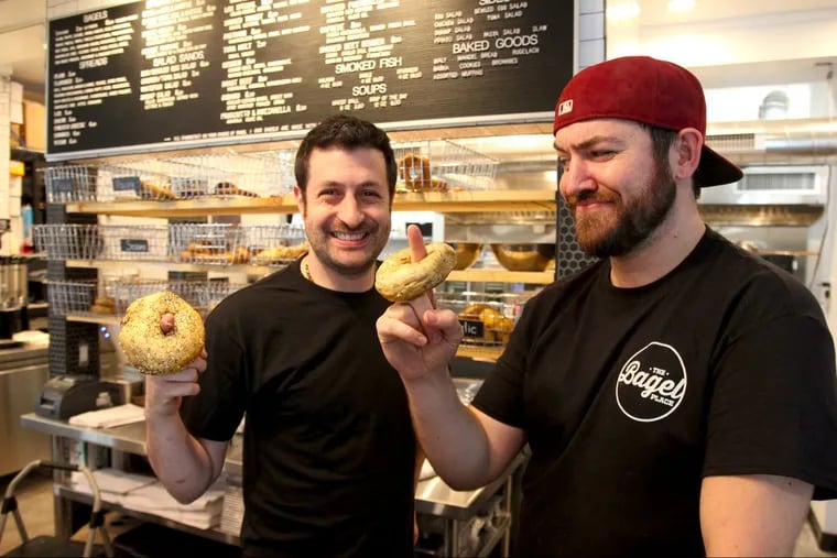 Owner Ringo Roseman (left) and baker Leo Rahill at The Bagel Place, 404 Queen St.
