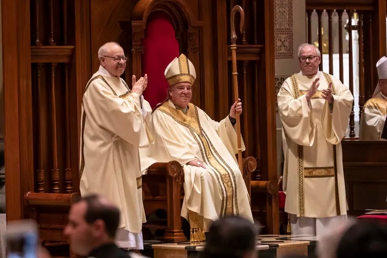 Archbishop Nelson J. Pérez sits on the cathedra, the bishop's seat, for the first time as Archbishop of Philadelphia.
