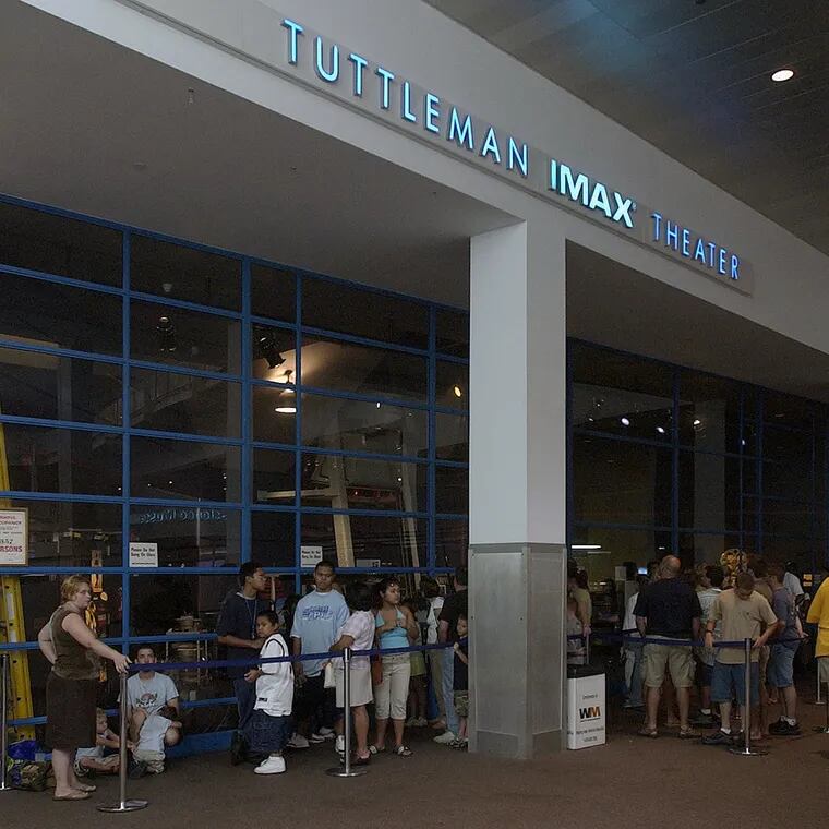 People outside the Tuttleman IMAX Theater in Franklin Institute in 2005, in line to enter a showing of “Charlie and the Chocolate Factory.” The theater, the only domed, large-format film venue in Philadelphia will be closed for good.