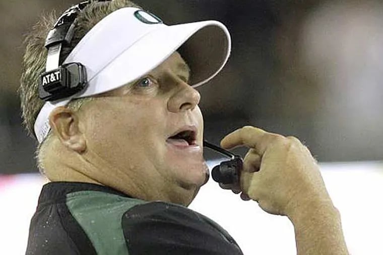 The Eagles have hired Chip Kelly after he originally chose to stay at Oregon. (Don Ryan/AP, File)