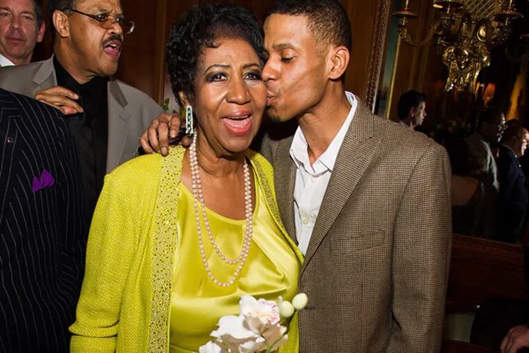 Aretha Franklin and her son Kecalf Cunningham attend her 72nd birthday celebration on Sunday, March 23, 2014 in New York. (Photo by Charles Sykes/Invision/AP)