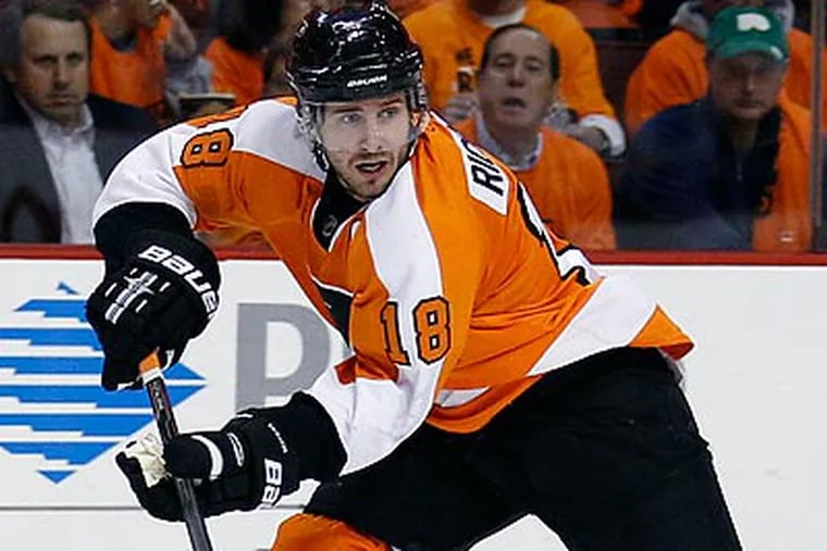 Peter Laviolette said that he and Mike Richards "continue to work on our relationship." (Yong Kim/Staff file photo)