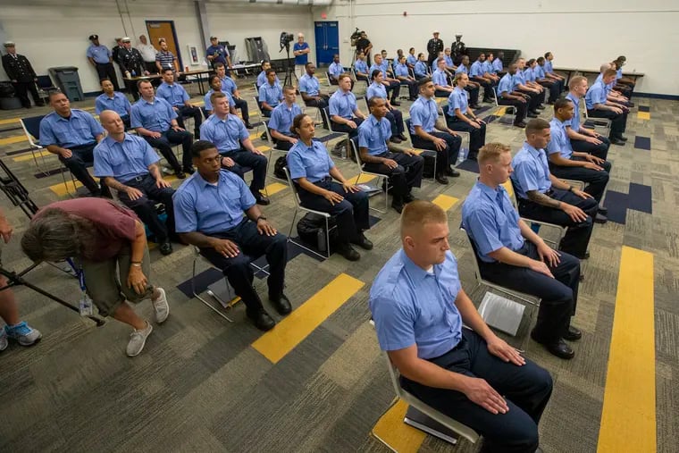 Recruits seated while being addressed by Commissioner Danielle Outlaw. Commissioner Outlaw (not shown) spoke to Class 395 at the Philadelphia Police Academy Training Center, Woodhaven Road in Northeast Philadelphia on Monday, July 12, 2021.