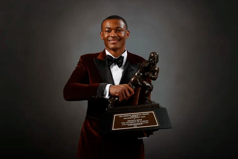 Alabama wide receiver DeVonta Smith poses for a photo after winning the Heisman Trophy.