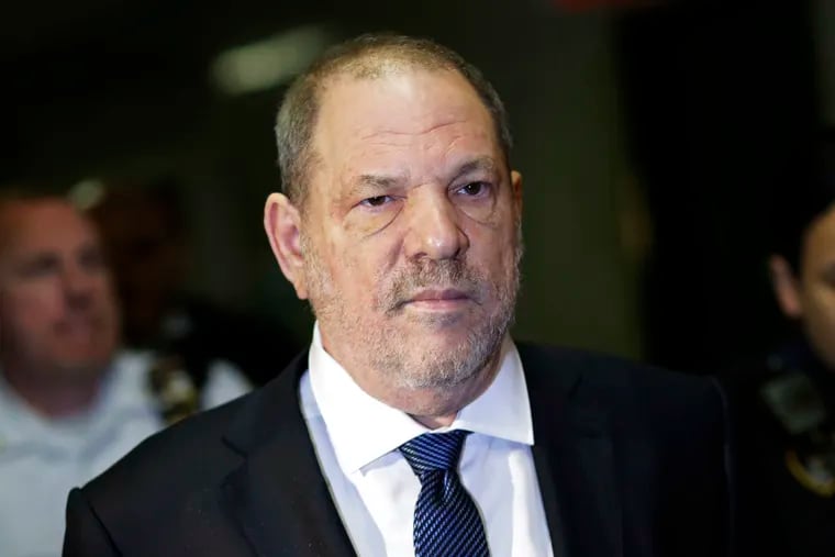 FILE - In this Oct. 11, 2018, file photo, Harvey Weinstein enters State Supreme Court in New York. A tentative deal is close to settling lawsuits brought against the television and film company co-founded by Weinstein, who has been accused of sexual misconduct by scores of women.