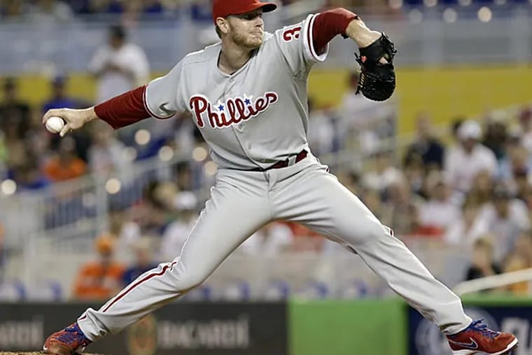 Philadelphia Phillies' Roy Halladay pitches to the Miami Marlins
during the first inning of a baseball game in Miami, Sunday, April 14,
2013. (AP Photo/Alan Diaz)