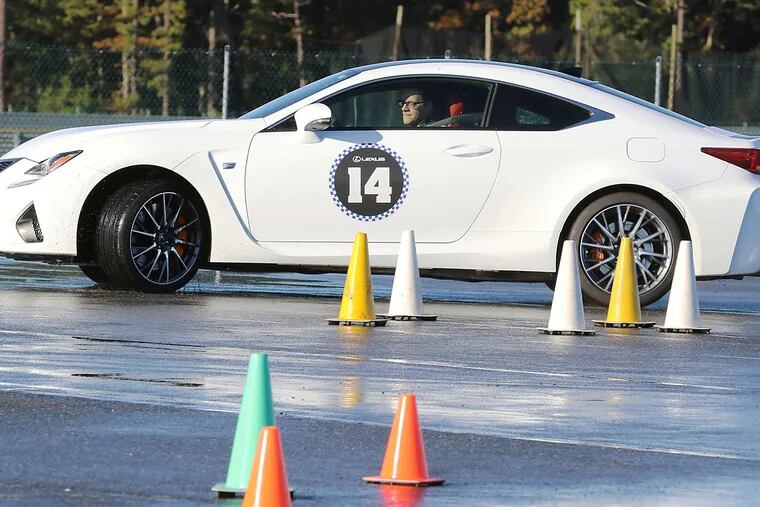 Scott Sturgis behind the wheel at New Jersey Motorsports Park in Millville. First, for the students, there was classroom time.