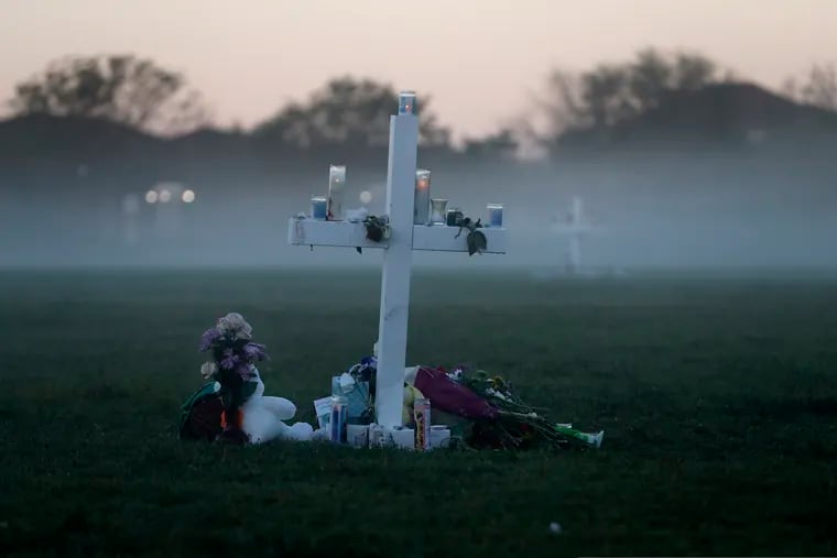 Early morning fog rises where 17 memorial crosses were placed, for the 17 deceased students and faculty from the shooting at Marjory Stoneman Douglas High School in Parkland, Fla, Feb. 17, 2018. One-third of the attackers who terrorized schools, houses of worship or businesses nationwide in 2017 had a history of serious domestic violence, two-thirds had mental health issues, and nearly all had made threatening or concerning communications that worried others before they struck, according to a U.S. Secret Service report on mass attacks.