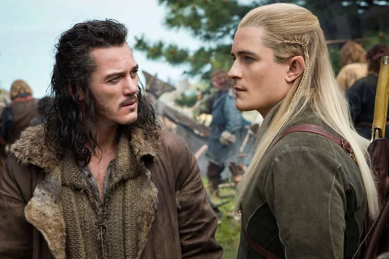 Luke Evans (left) and Orlando Bloom in what amounts to a giant-screen videogame of clashing CGI legions, of dialogue as hoary as it is hilarious.