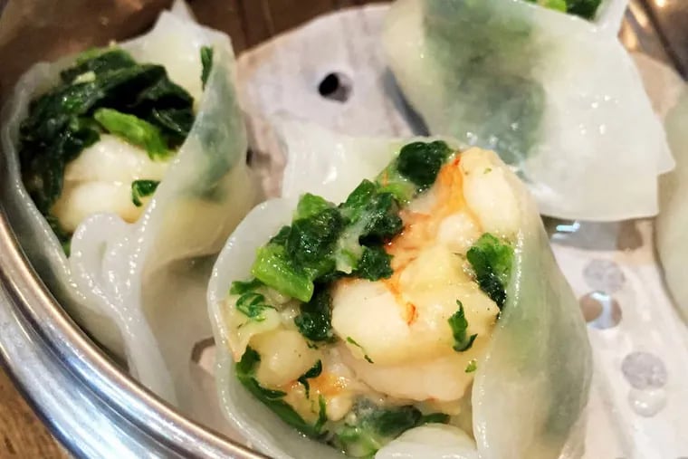 Steamed shrimp and snow pea leaf dumplings from the new Nom Wah Tea Parlor in Chinatown. ( Craig LaBan / Staff )