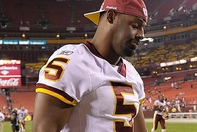 Donovan McNabb is still getting used to wearing a different team's colors. (Susan Walsh/AP)