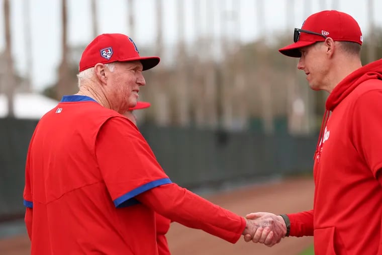 Charlie Manuel, left, is greeted on the second day of Spring Training in Clearwater, Fla. on Thursday, Feb. 15, 2024.