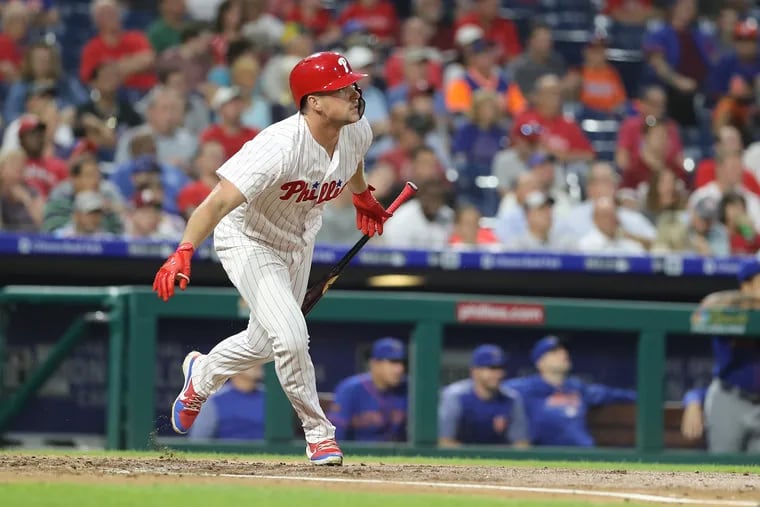 Phillies' slugger Rhys Hoskins doubles in the third inning against the Mets on Wednesday.