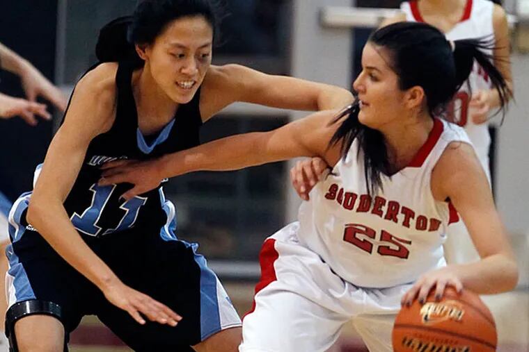 North Penn's Irisa Ye, left, plays tough defense with Souderton's Bianca Picard, right, in the third quarter. (Michael Bryant/Staff Photographer)